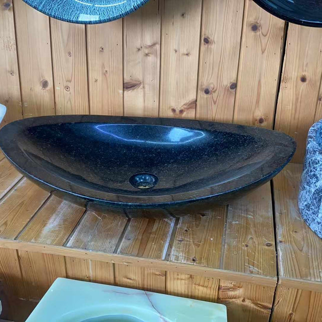 Schwarzes Aufsatzwaschbecken aus Naturmarmor, moderne Ausführung