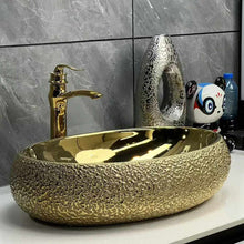 Load image into Gallery viewer, Modern Luxury Golden Oval Porcelain Bathroom Sink – Elegant Countertop Wash Basin
