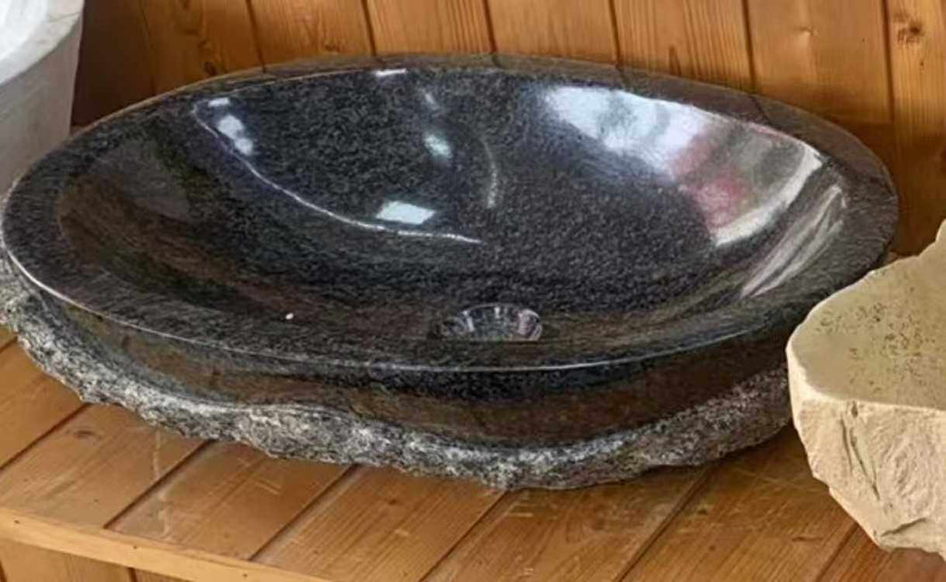 A Smooth Black Natural Marble Stone  Vessel Sink with Durable Finish Perfect for Modern Bathrooms Seeking Style and Functionality