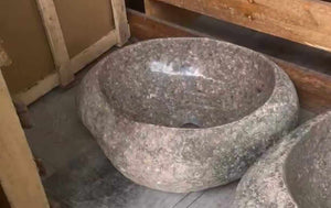 Organic Beauty of a Natural Stone Vessel Sink Rustic Bathroom Design Complement Your Contemporary Space with the Harmonious Blend of Styles