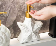 Load image into Gallery viewer, Ocean-Themed Porcelain Soap Dispenser – Starfish, Shell, and Conch Shape with Elegant Glaze and Durable Pump Head
