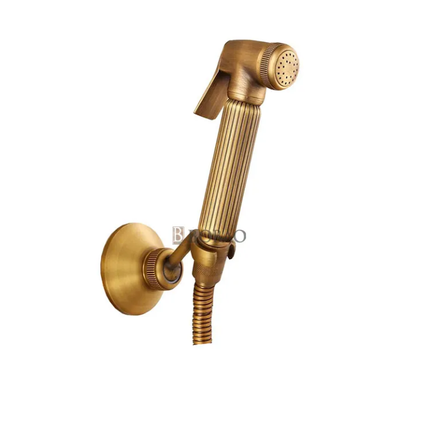Bronze wall-mounted shower head on a white background