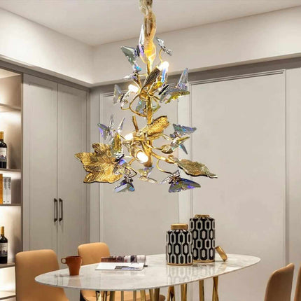Sculptural  Butterfly Bloom Chandelier Design Whimsical Fusion of Crystal Wings and Golden Leaves Illuminating Elegance and Natural Charm in a Modern Dining Space Delicate Light Dances