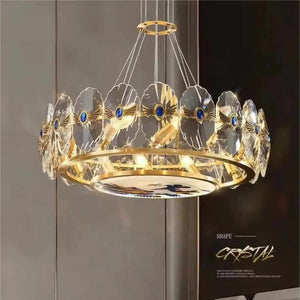 Radiant Crystal Discs A Modern Chandelier with Sapphire Accents Illuminating Elegance and Contemporary Design