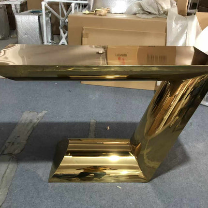 A Sleek Gold Electroplated 304 Stainless Steel Console Table with a Striking Z-Shaped Design Adds a Touch of Modern Sophistication Furniture