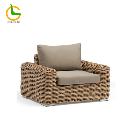 Wicker armchair with brown cushions on a white background