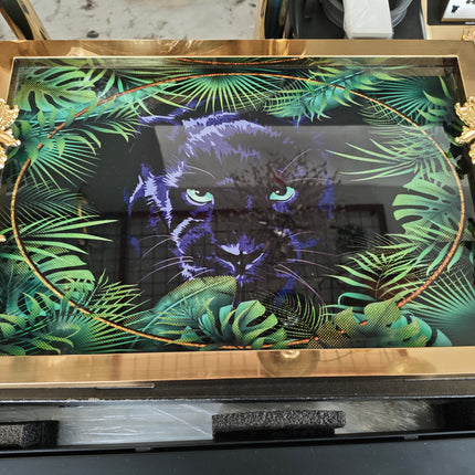 Decorative tray with a panther design and gold frame on a reflective surface.

gold serving tray
panther decorative tray
luxury tray with handles
glass serving tray gold
coffee table tray decor
modern decorative tray
luxury home accessories
rectangular serving tray