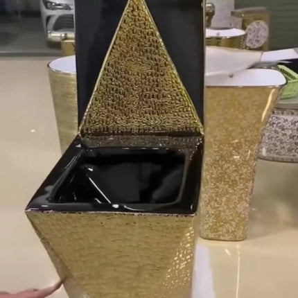 A toilet with a black and gold color scheme, featuring a rough textured design on the bowl and a sharp angled lid.

gold electroplated toilet bowl
luxury gold ceramic toilet
royal bathroom toilet wc
designer gold toilet bowl
luxury bathroom sanitary ware
modern gold bathroom toilet
premium porcelain toilet bowl
dubai style luxury toilet