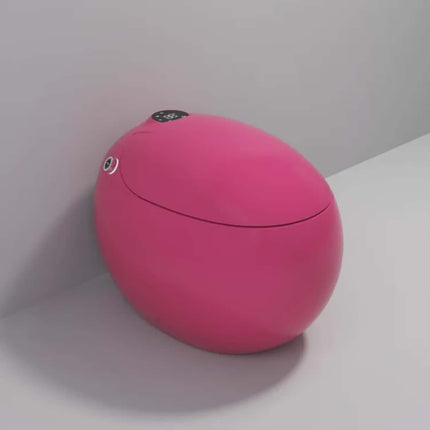 Pink spherical object with a lid on a white surface