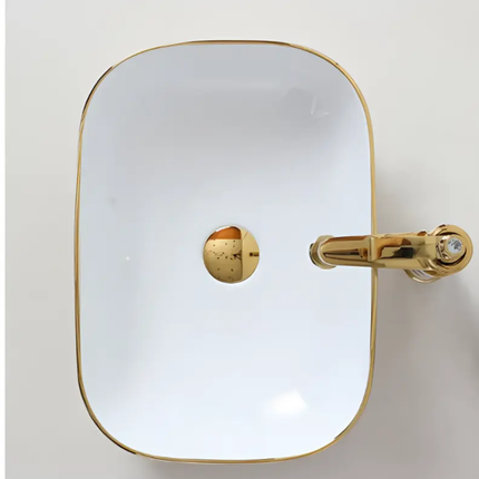 Square mirror with gold frame and handle on a white background