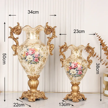 Two ornate vases with floral designs and gold accents, shown with measurements against a white background.