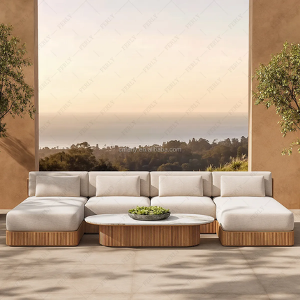 Modern outdoor sofa set with wooden legs and a scenic background