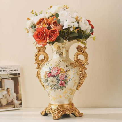 Decorative vase with floral design and gold accents on a beige background