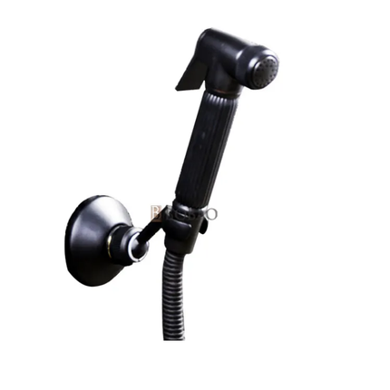 Black shower head with flexible hose on a light gray background