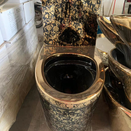 The image shows a toilet bowl with a black base color and gold-colored floral patterns. It is floor-mounted and appears to have a smooth, glossy finish.

black gold floral toilet bowl
luxury electroplated toilet
designer porcelain wc toilet
modern black gold toilet
luxury bathroom toilet bowl
one piece ceramic toilet
decorative floral toilet bowl
premium sanitary ware toilet