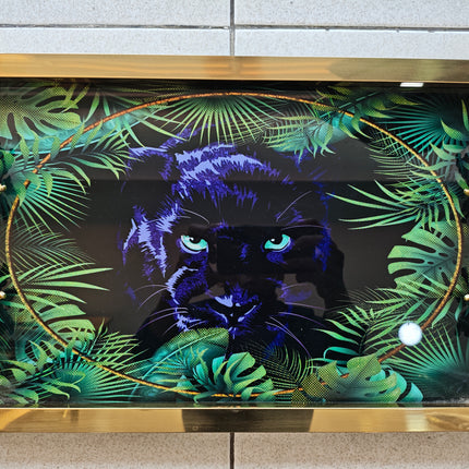 Decorative tray with a panther design and gold frame on a tiled wall.

gold serving tray
panther decorative tray
luxury tray with handles
glass serving tray gold
coffee table tray decor
modern decorative tray
luxury home accessories
rectangular serving tray