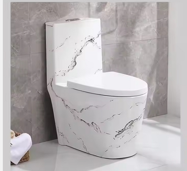 A white marble-effect porcelain toilet bowl with a modern design, featuring a sleek shape and placed in a bathroom setting.

marble toilet bowl
luxury marble ceramic toilet
electroplated bathroom toilet
modern marble wc toilet
luxury porcelain toilet bowl
designer bathroom toilet
modern sanitary ware toilet
high end bathroom toilet