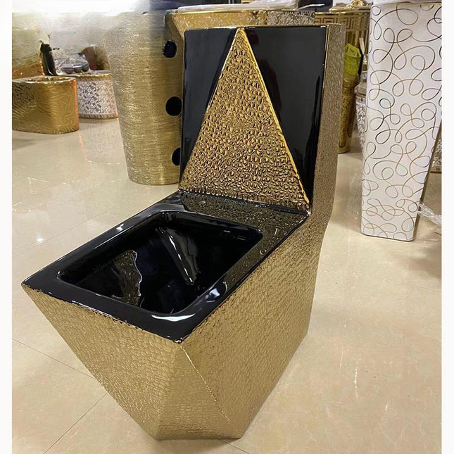 Gold and black geometric trash can on a tiled floor

gold electroplated toilet bowl
luxury gold ceramic toilet
royal bathroom toilet wc
designer gold toilet bowl
luxury bathroom sanitary ware
modern gold bathroom toilet
premium porcelain toilet bowl
dubai style luxury toilet