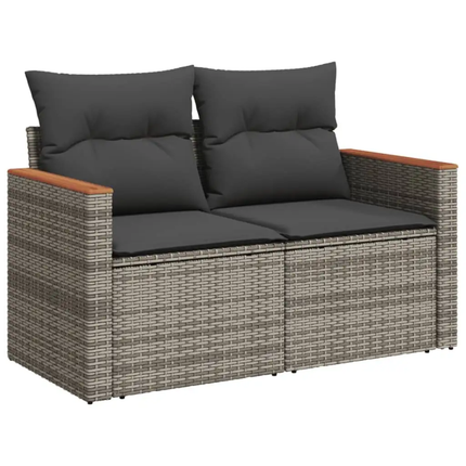 Outdoor sofa with dark cushions on a white background