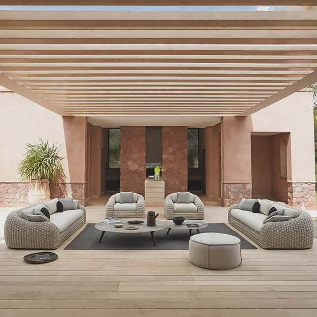 Outdoor patio with modern furniture and a wooden pergola