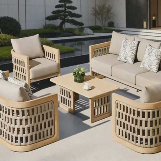 Outdoor patio furniture set with beige cushions and wooden frames in a modern garden setting.