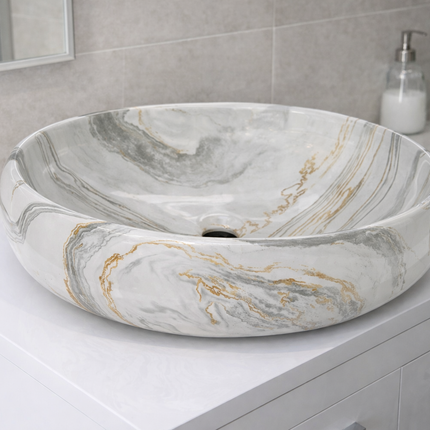 Marble-patterned sink on a bathroom counter with a neutral background

porcelain countertop sink
marble pattern bathroom sink
tabletop porcelain basin
bathroom cabinet sink
luxury bathroom wash basin
electroplated porcelain sink
modern countertop bathroom basin
marble design bathroom sink
vanity countertop wash basin