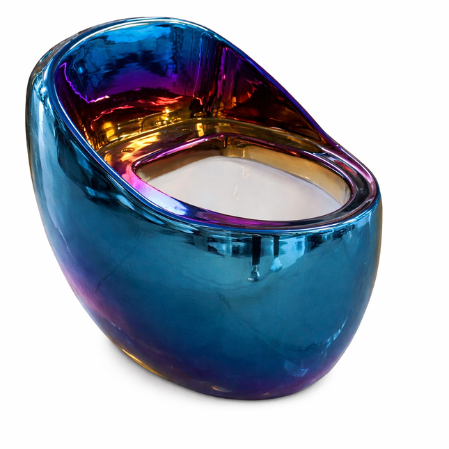 Multicolored glass candle holder with a white candle inside on a white background