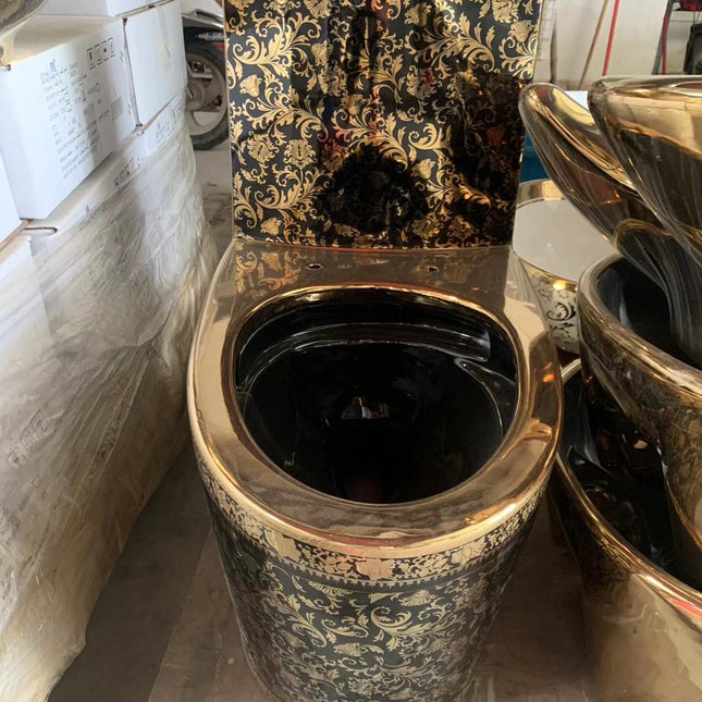 Schwarze und goldfarbene, einteilige, bodenstehende, längliche WC-Schüssel aus Porzellan mit floralem Muster, galvanisiert 