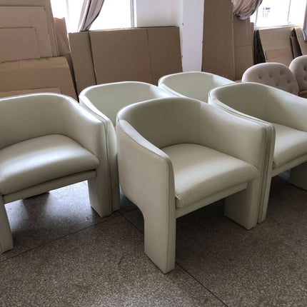 Set of beige armchairs in a room with cardboard boxes and other furniture.

modern sculptural lounge chair
velvet reclining armchair
designer lounge chair
modern velvet accent chair
living room reclining chair
luxury lounge armchair
sculptural velvet chair
modern hotel lounge chair
designer living room chair