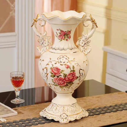 Decorative ceramic vase with floral patterns on a table