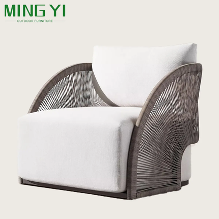 Chair with wicker backrest and white cushion on a light background, branded as MING YI Outdoor Furniture.