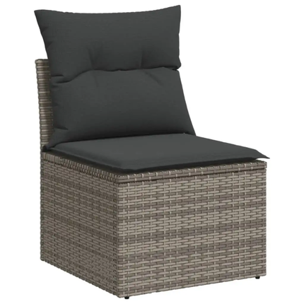 Outdoor chair with wicker frame and dark cushions on a white background