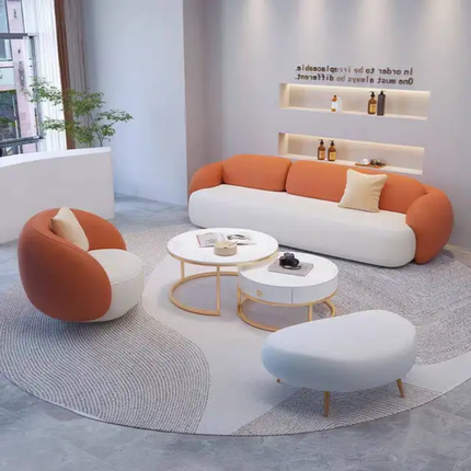 Modern living room with orange and white furniture