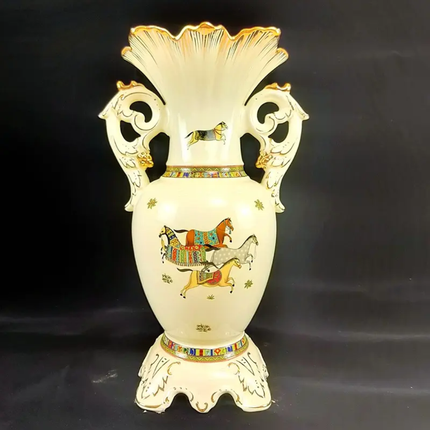 Decorative vase with horse illustrations on a dark background