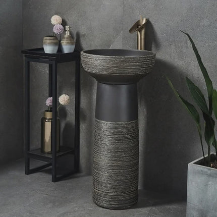 Modern Textured Pedestal Sink with Brass Faucet – Elegant Contemporary Bathroom Basin