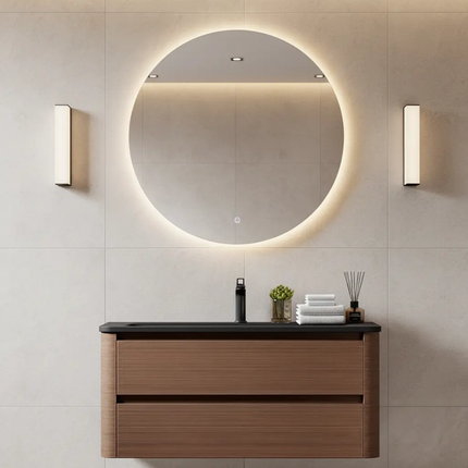Minimalist fluted wood floating bathroom vanity paired with round LED backlit mirror for modern clean style