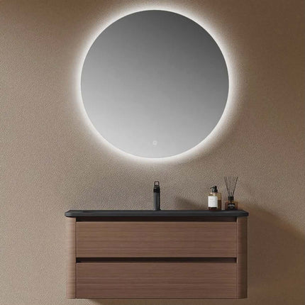 Minimalist fluted wood floating bathroom vanity paired with round LED backlit mirror for modern clean style