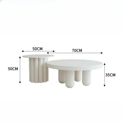 Two white side tables with cylindrical legs on a white background