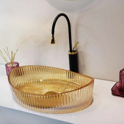 Fluted Amber Design with Radial Interior Pattern and Gold-Tipped