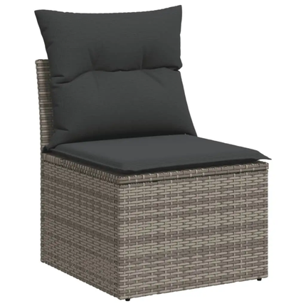 Outdoor chair with wicker frame and dark cushions on a white background