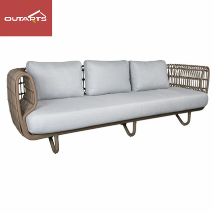 Outdoor sofa with wicker frame and light gray cushions on a white background, featuring Outarts logo.