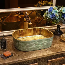 Lade das Bild in den Galerie-Viewer, Green with Golden Plated Countertop Ceramic Wash Basin
