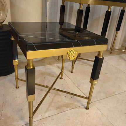 Side Table Polished Marble Seat Gilded Medusa Medallion Detail Geometric Silhouette Refined Opulence Ideal  Luxury Interiors