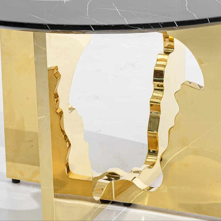 Medusa Gaze Centerpiece A Round Marble and Gold Accent Table Featuring an Intricate Medusa Profile Cutout  Fusion of Classic Luxury and Modern Design This Table Serves as a Striking Focal Point Where the Elegance of Marble Meets the Opulence of Gold