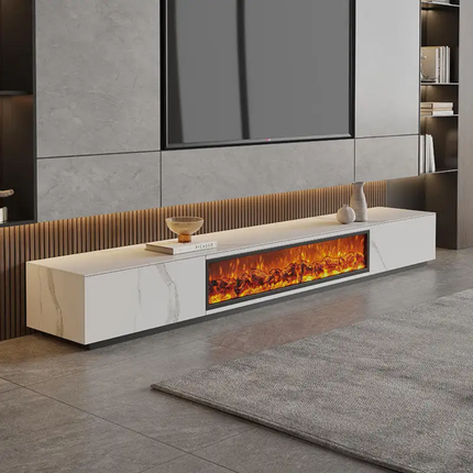 Modern living room with a long white entertainment console featuring an electric fireplace.
