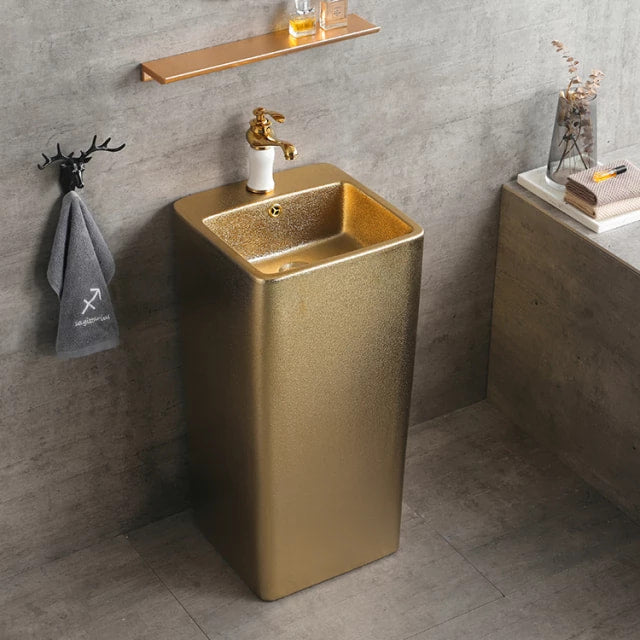 Radiant Gold Finish a Statement Sink with Sculptural Elegance Pedestal Wash Basin