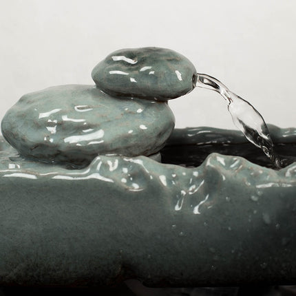 Un cadeau créatif et technique exquis : une décoration d'eau courante pour la maison ou le bureau.