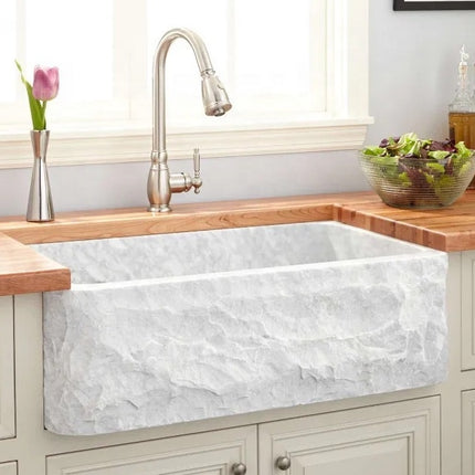 Weißes Küchenwaschbecken aus Stein mit Schürze 