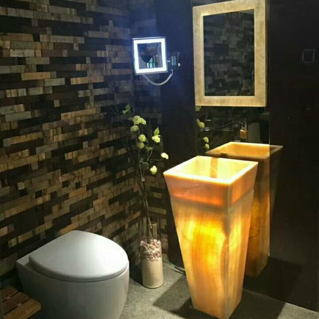 Lavabo sur pied en onyx antique avec éclairage LED et lave-mains intégré. 