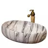 Cargar imagen en el visor de la galería, Luxury wash basin ceramics stone basin Bathroom Sink factory supply
